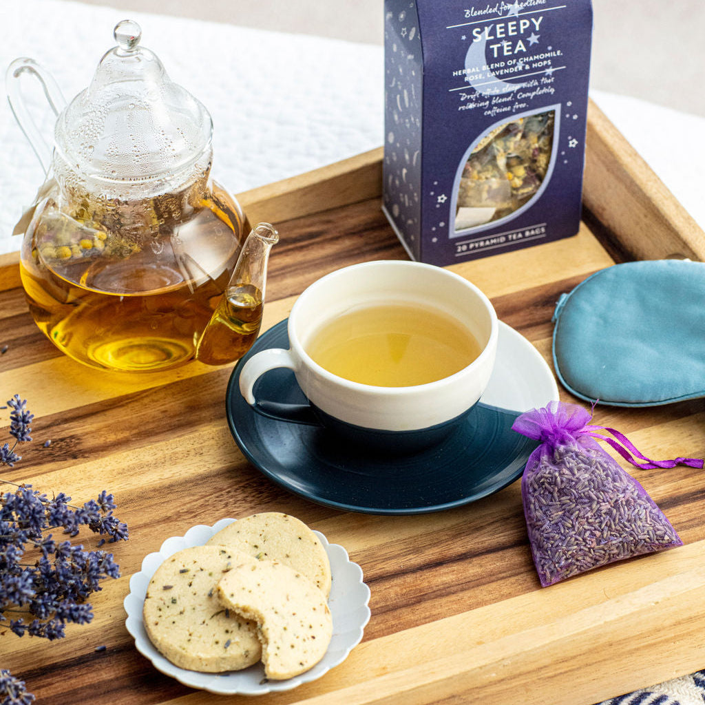 Tea set with Castle Farm tea and shortbread on a wooden tray