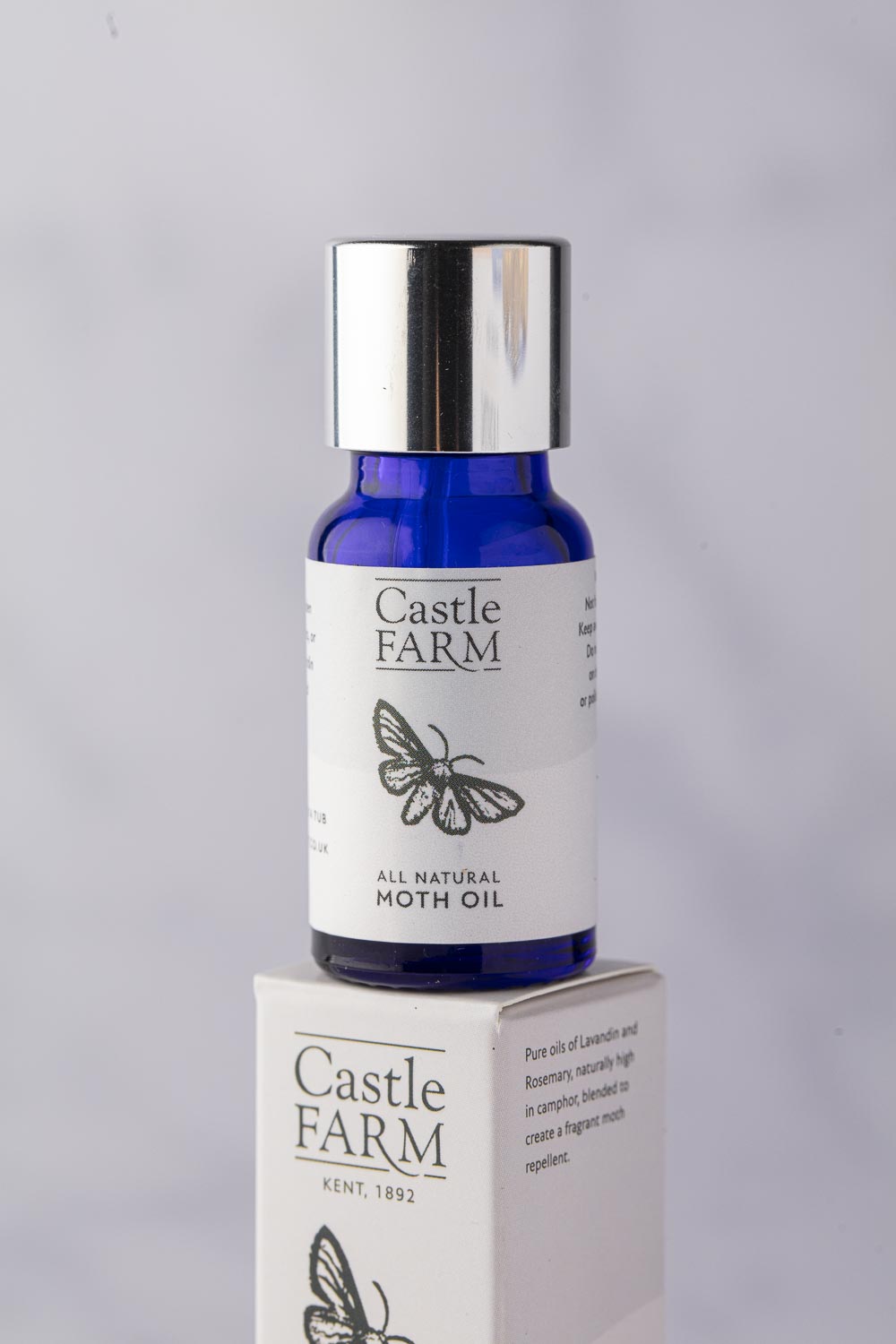Natural repellent top for moths